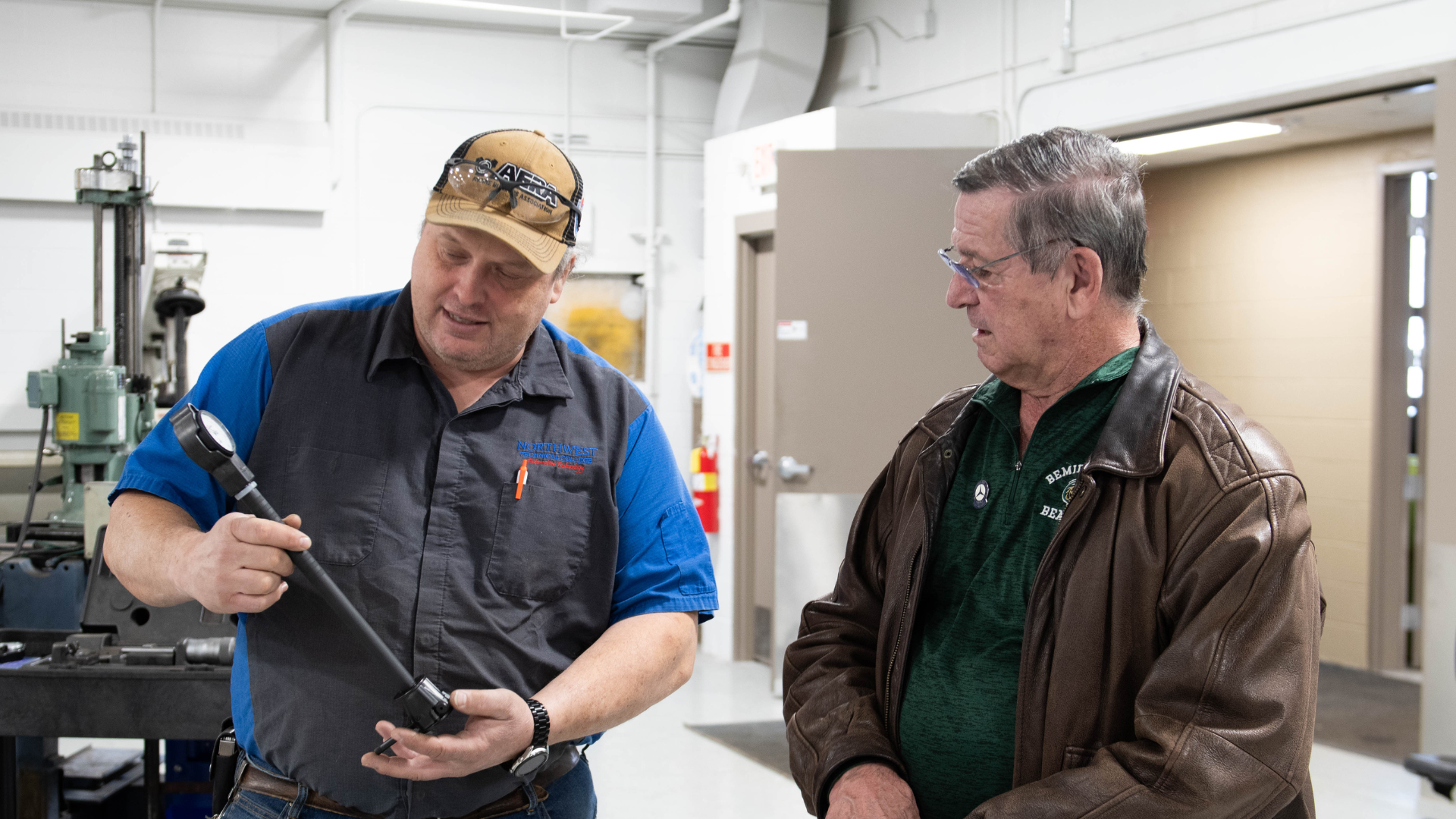 Jim Walrath and Mark Johnson (automotive services and technology faculty member) with Sunnen dial bore gauge