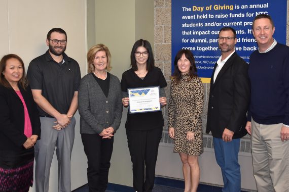 NTC student Antavia Pendegayosh poses with representatives from Delta Dental, NTC vice president Ketmani Kouanchao and NTC president John L. Hoffman