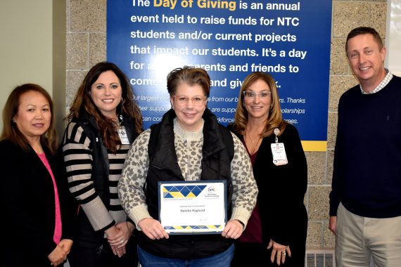 NTC student Natalie Haglund poses with representatives from Sanford Health and NTC vice president Ketmani Kouanchao and NTC president John L. Hoffman