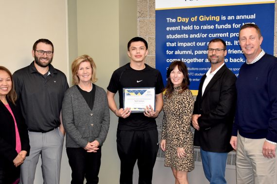 NTC student Tyrell Jackson poses with representatives from Delta Dental, NTC vice president Ketmani Kouanchao and NTC president John L. Hoffman